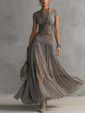 Gabriel Moreno - Conjunto Top Gris de Encaje Transparente y Falda Maxi Plisada