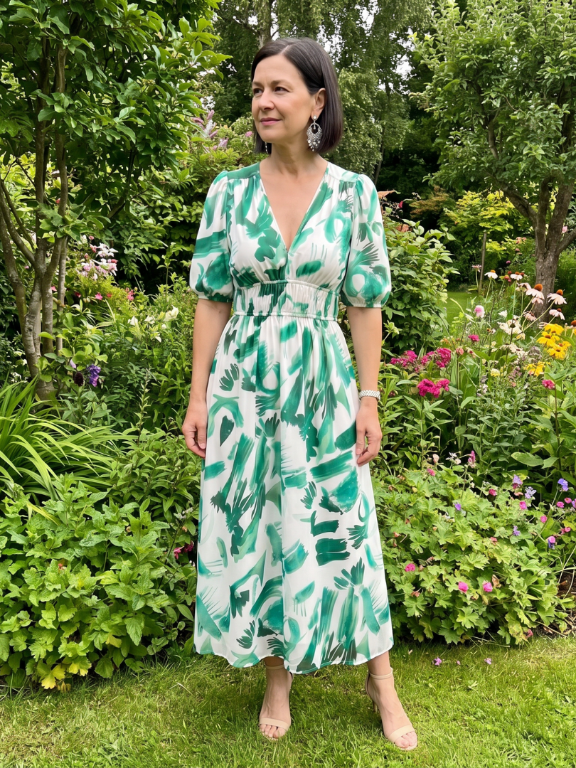 Candlia | Vestido midi de estampado abstracto con escote en V y mangas abullonadas