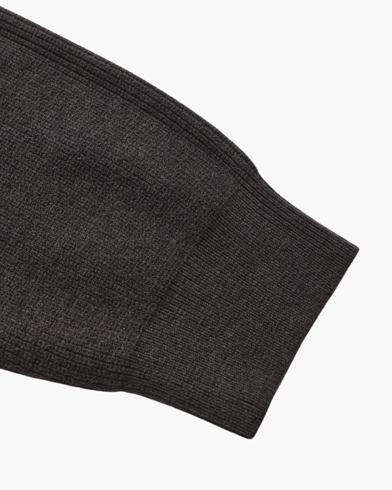 Jersey refinado con media cremallera