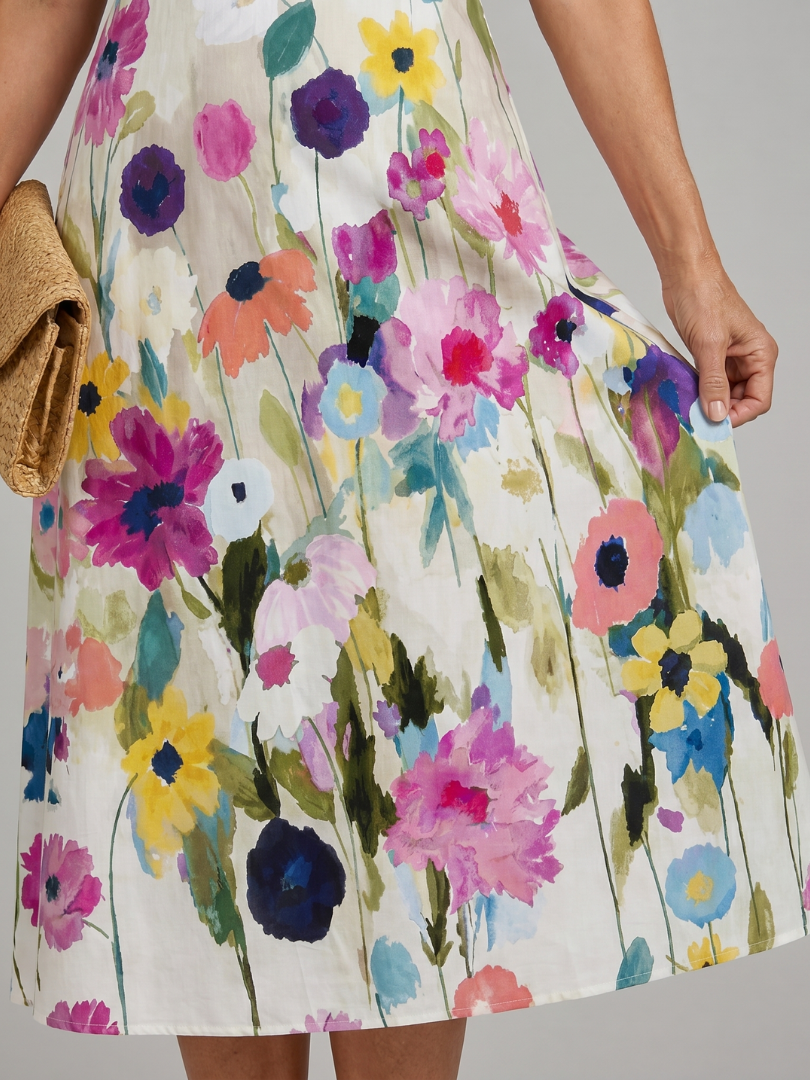 Flory | Vestido midi con estampado floral, sin mangas y cuello redondo