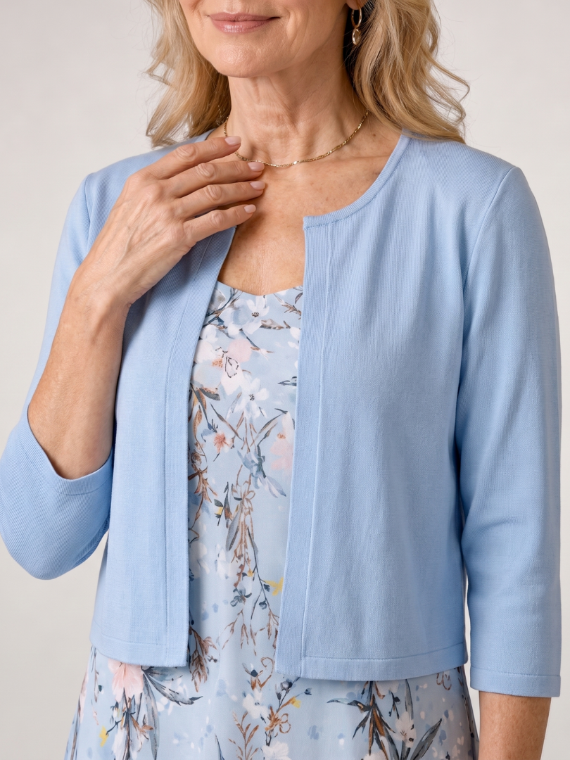 Celeste | Vestido midi con estampado floral y chaqueta corta sin mangas a juego