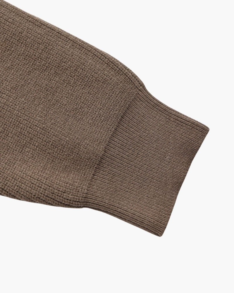 Jersey refinado con media cremallera