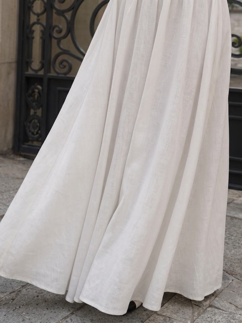 Jeven | Vestido midi sin mangas, con escote halter y cuerpo entallado
