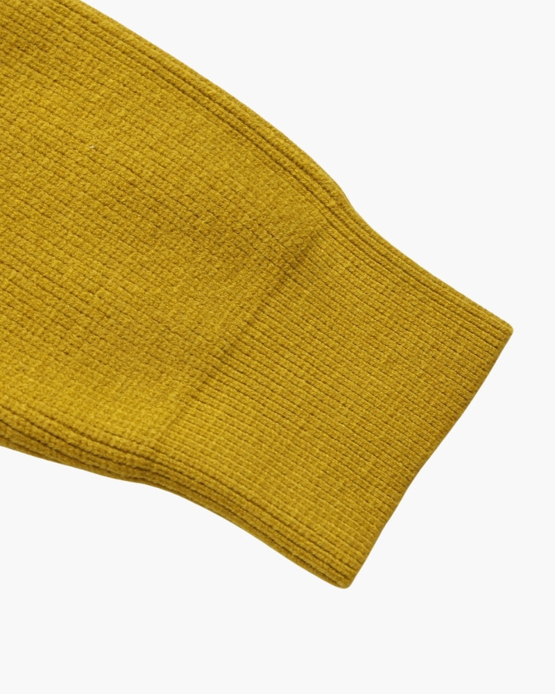 Jersey refinado con media cremallera