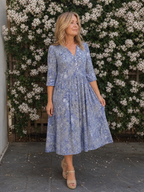 Picao | Vestido midi de aire vintage con abertura frontal y mangas tres cuartos