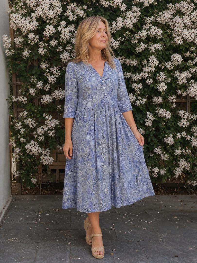 Picao | Vestido midi de aire vintage con abertura frontal y mangas tres cuartos