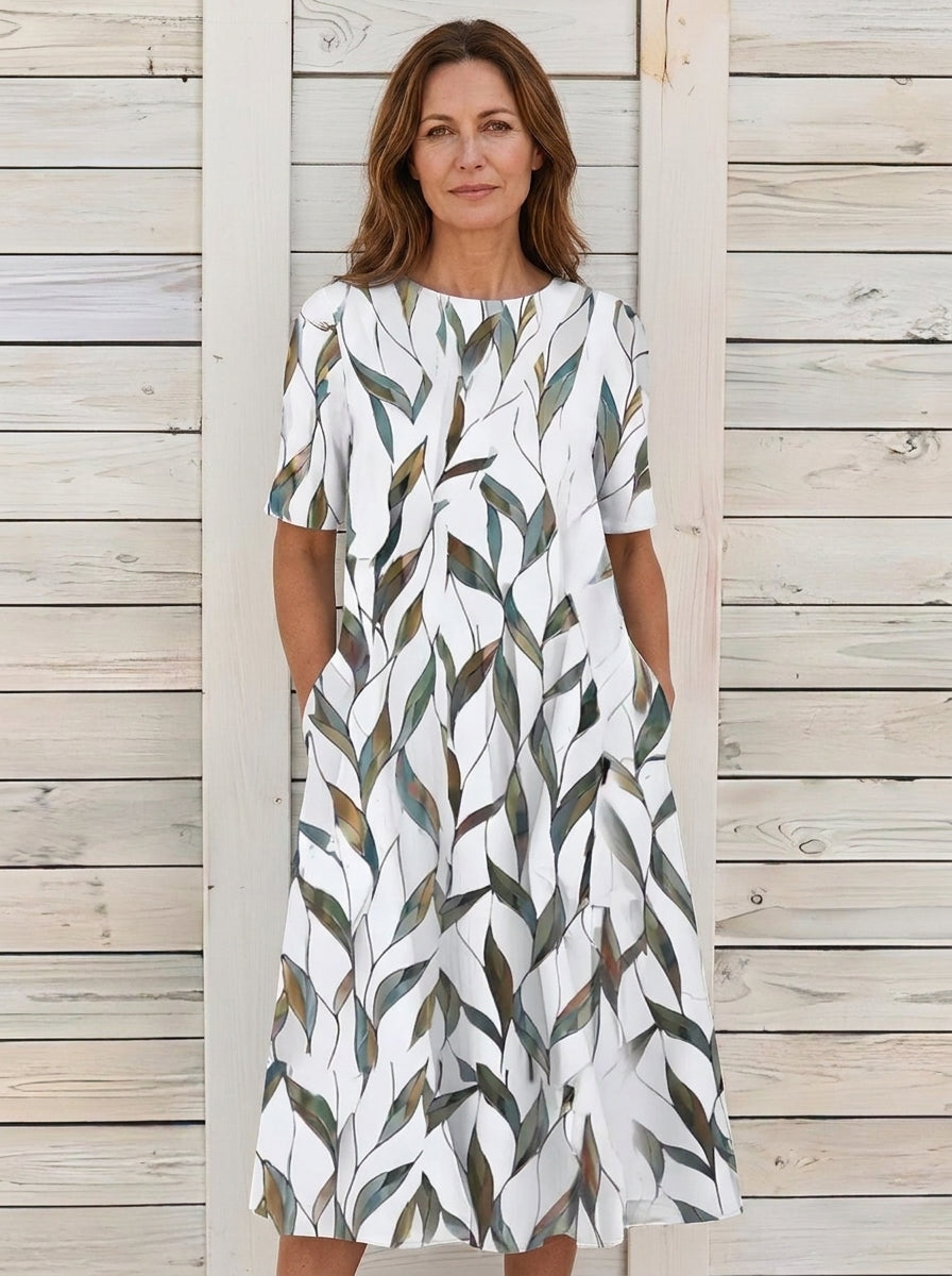 Carmen | Vestido midi azul con estampado floral