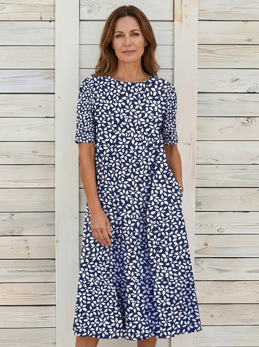 Carmen | Vestido midi azul con estampado floral
