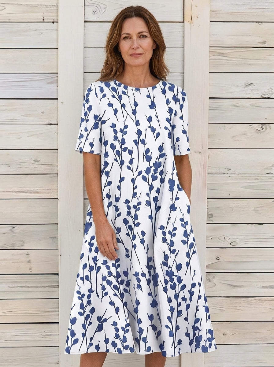 Carmen | Vestido midi azul con estampado floral