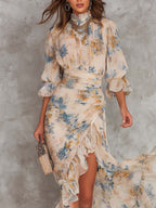 Gabriel Moreno - Vestido Maxi en Chifón Irregular con Estampado Floral y Cuello Alto Beige