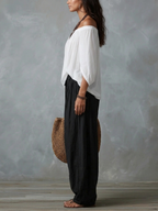 Gabriel Moreno - Conjunto Top Blanco Off-Shoulder y Pantalones Linterna Anchos