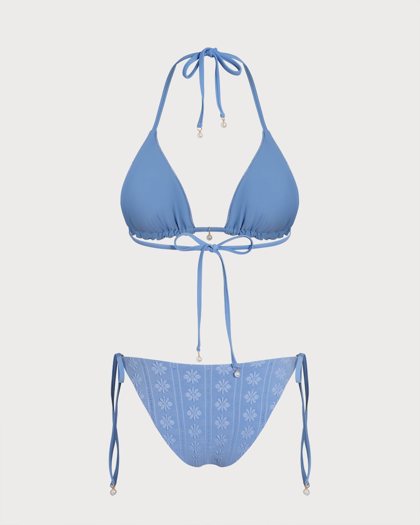 Conjunto de bikini reversible con top halter y braguita triangular azul