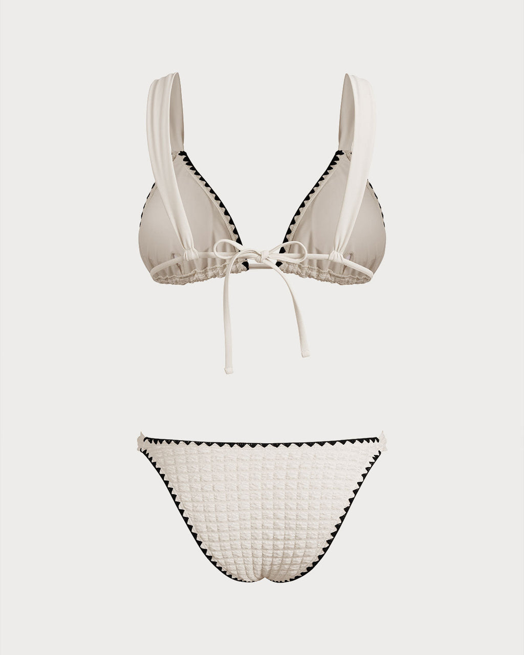 Conjunto de bikini con triángulos en blanco y contraste